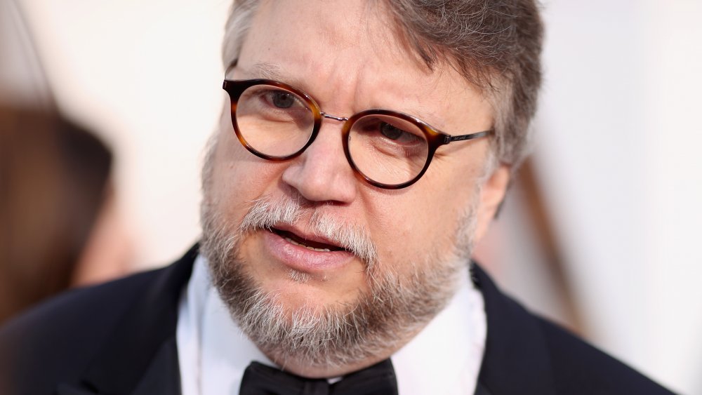 Writer and director Guillermo Del Toro wears a bowtie.