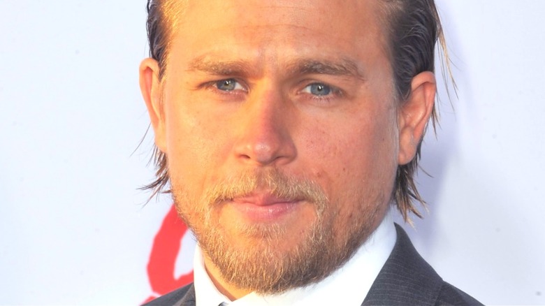 Charlie Hunnam looks stoic