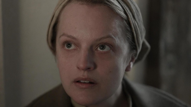 Elisabeth Moss appears as June