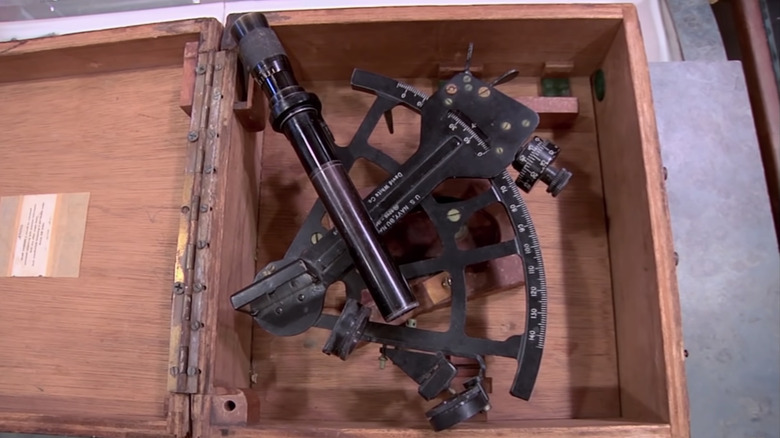 A Navy sextant in a wooden box on Pawn Stars