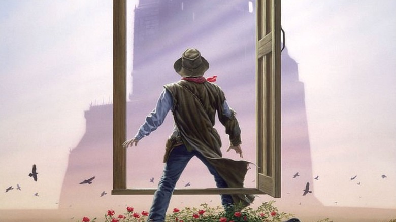 Roland standing in front of the Dark Tower in Michael Whelan cover art