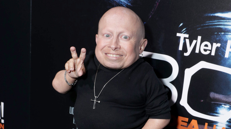 Verne Troyer posing with a peace sign at the Los Angeles premiere of "Boo! A Madea Halloween" in 2016.