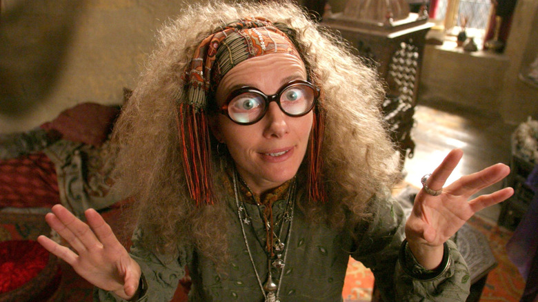Professor Trelawney holding both of her hands up in Harry Potter and the Prisoner of Azkaban