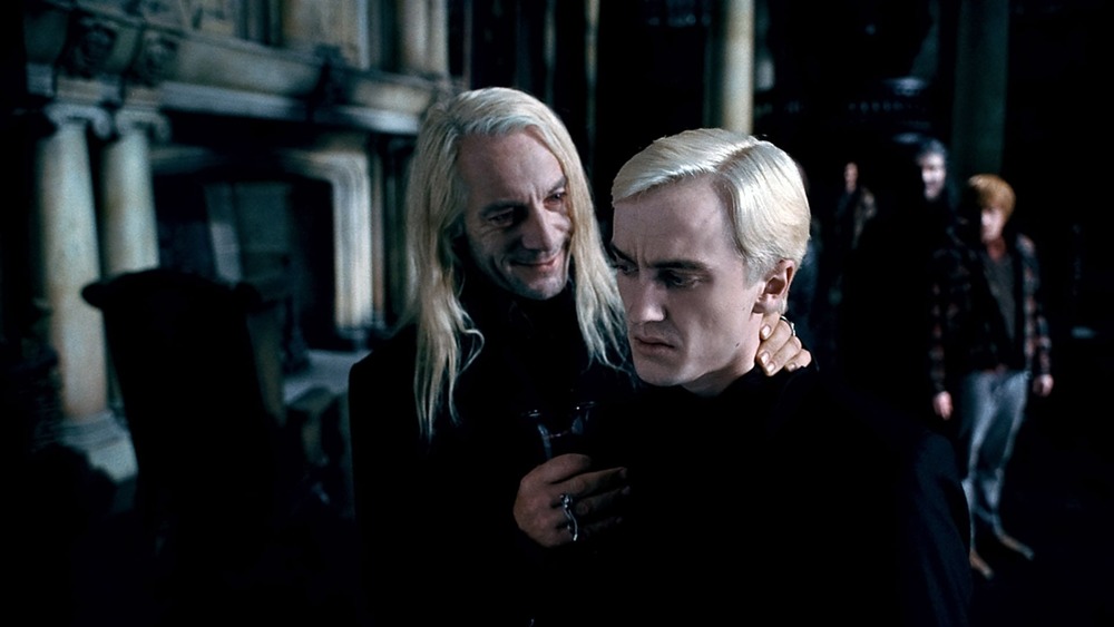 Jason Isaacs and Tom Felton in Harry Potter