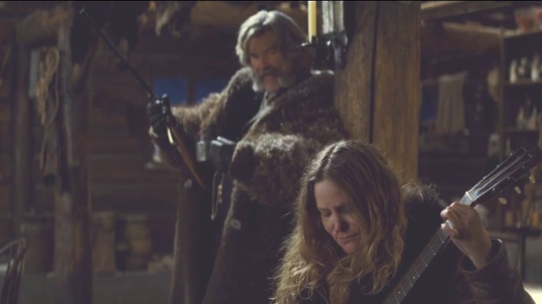 Kurt Russell destroying a guitar