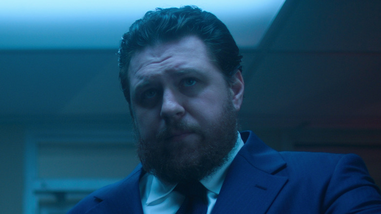 Cameron Britton Hazel blue suit