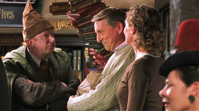 Mark Williams as Mr Weasley, Tom Knight as Mr Granger and Heather Bleasdale as Mrs Granger in Harry Potter and the Chamber of Secrets