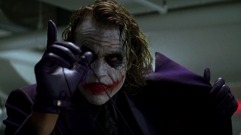 Ledger in Joker makeup grinning