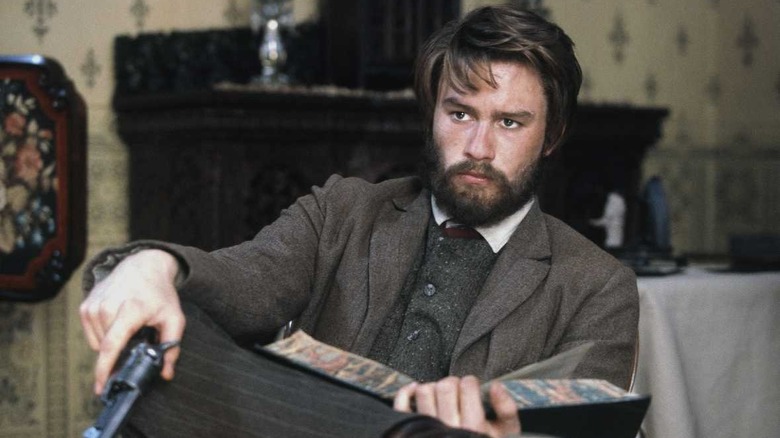 Bearded Ledger pointing gun