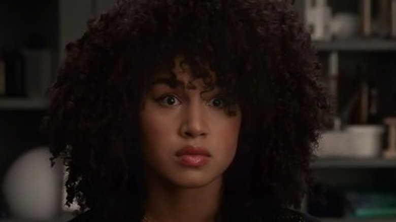 Gina looks startled