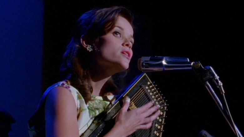 June Carter performs on stage