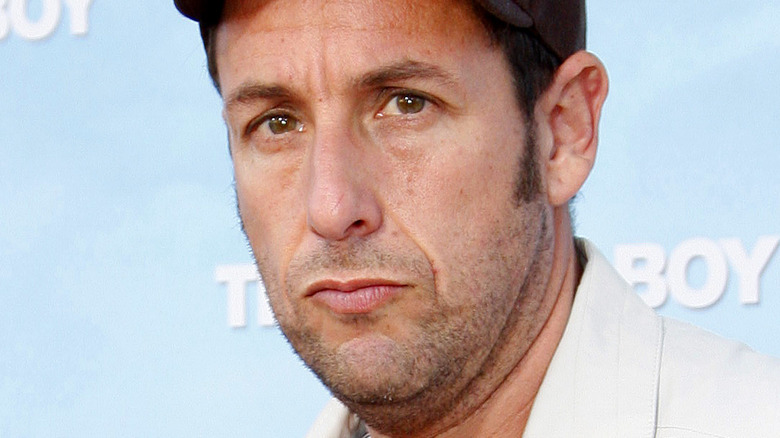 Adam Sandler wearing a hat