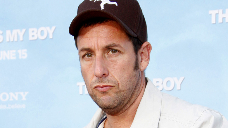 Adam Sandler wearing a hat