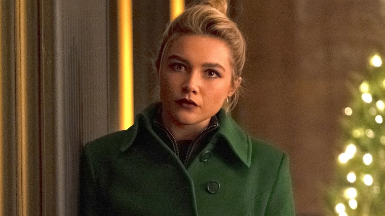 Yelena looking upset in green coat