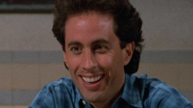 Jerry Seinfeld smiling on Seinfeld