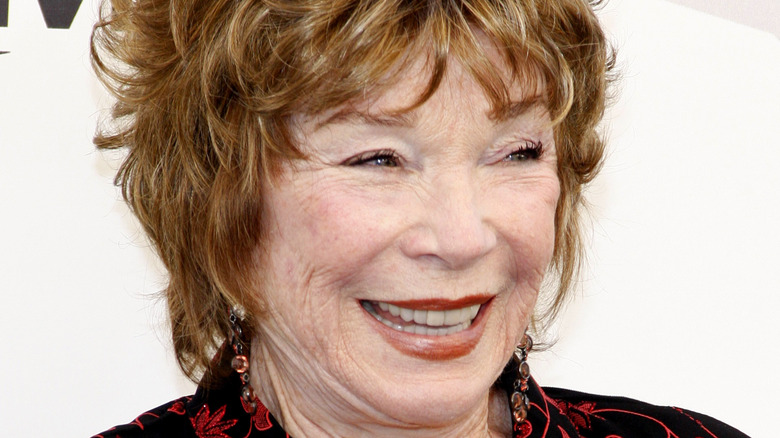 Shirley MacLaine laughing