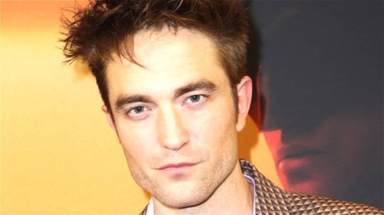 Robert Pattinson smirking