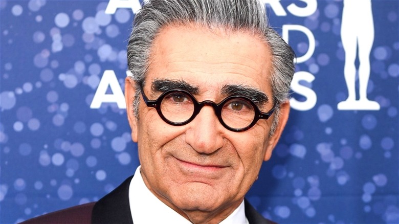 Eugene Levy in black glasses