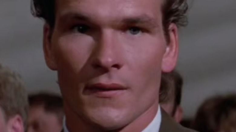 Patrick Swayze looking ahead in The Outsiders