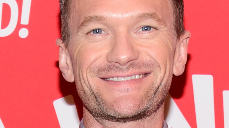 Neil Patrick Harris smiling at event