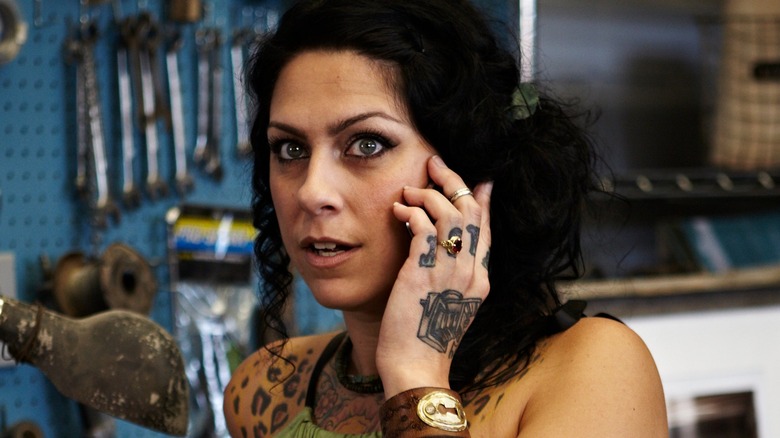 Danielle Colby talking on the phone