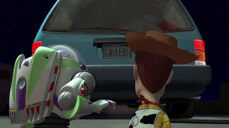 Buzz and Woody watch car drive away
