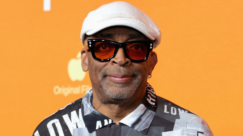 Spike Lee smiling on the red carpet in 2025