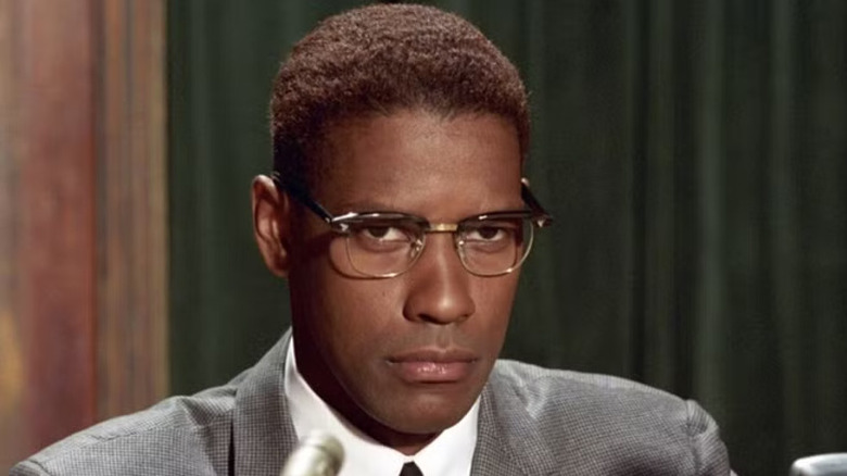 Malcom X staring at a press conference in "Malcolm X" (1992)