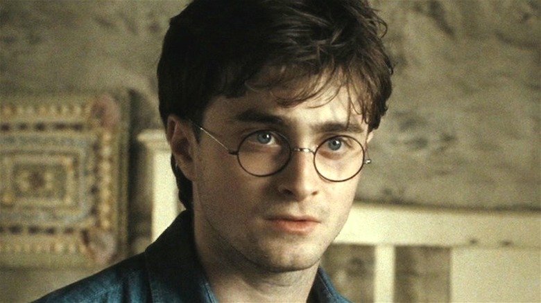 Harry Potter stares thoughtfully