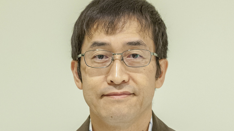 Author Junji Ito holding book