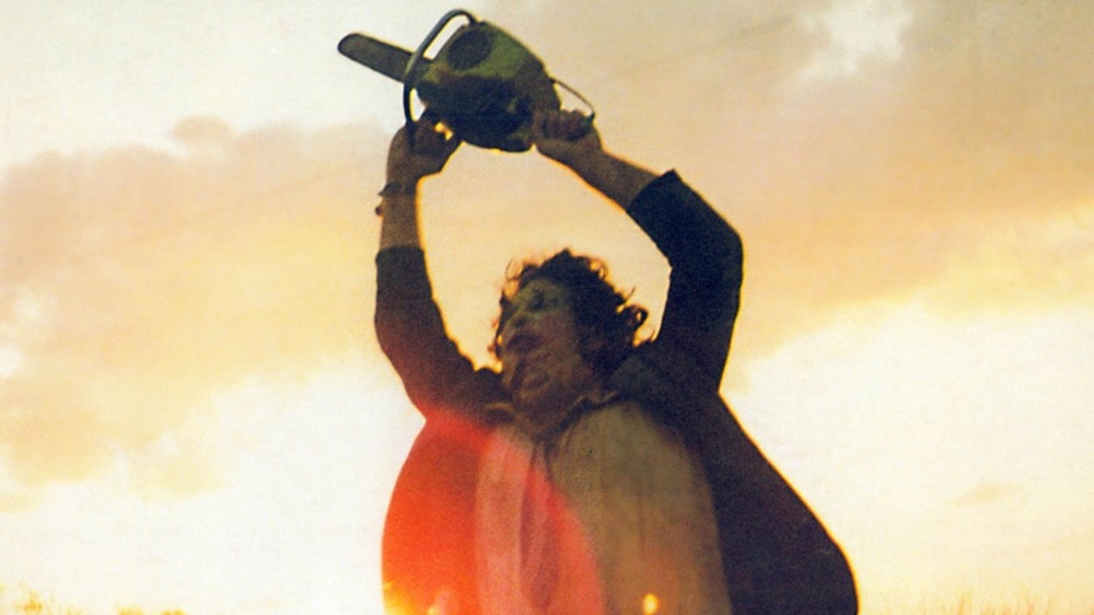 Leatherface waving a chainsaw