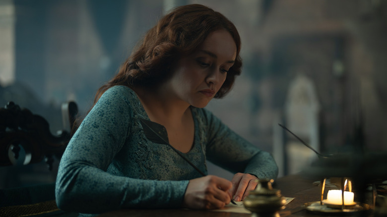 Alicent writing a letter by candlelight in House of the Dragon Season 3 (2026)