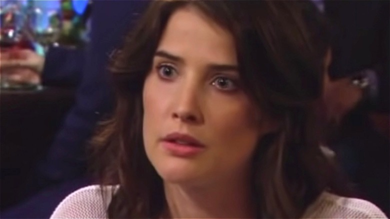 Robin Scherbatsky sitting in bar