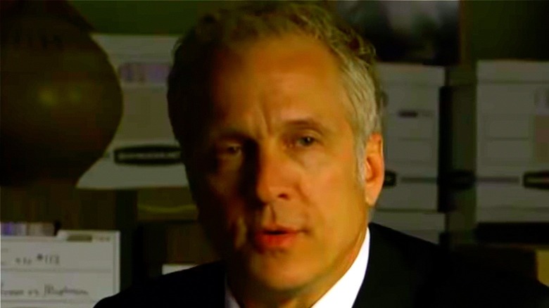 Patrick Fabian looking serious