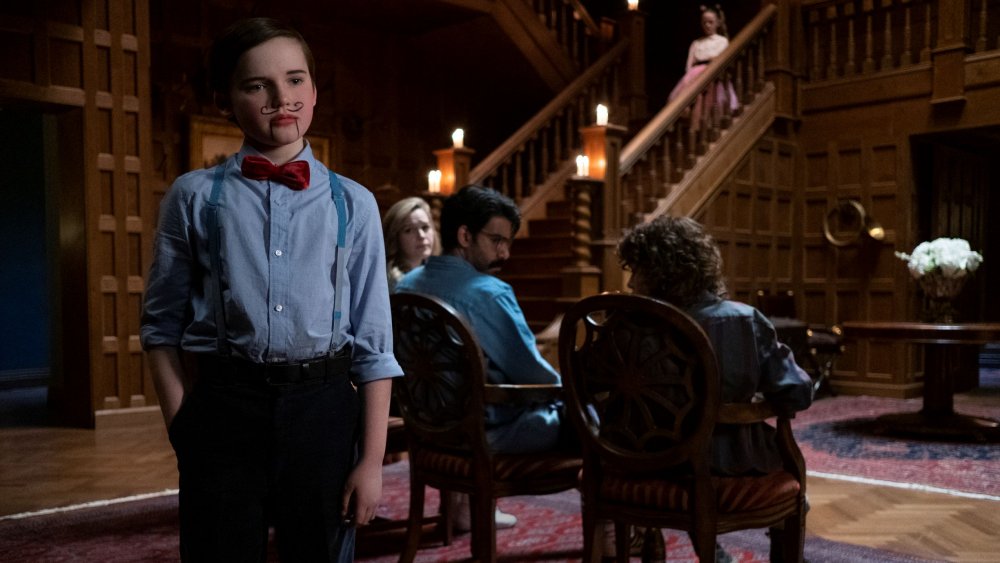 Benjamin Evan Ainsworth as Miles and cast on Netflix's The Haunting of Bly Manor