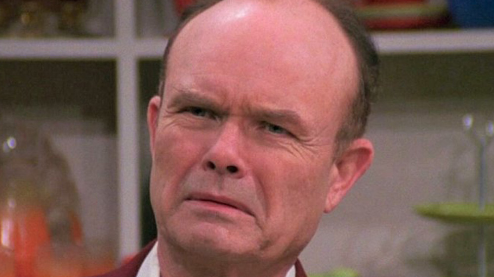 Red Foreman grimaces