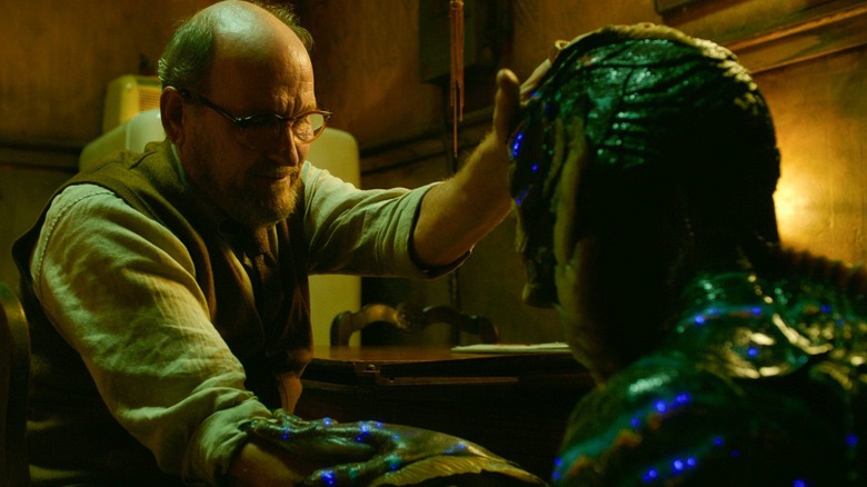 Giles comforting the sea creature