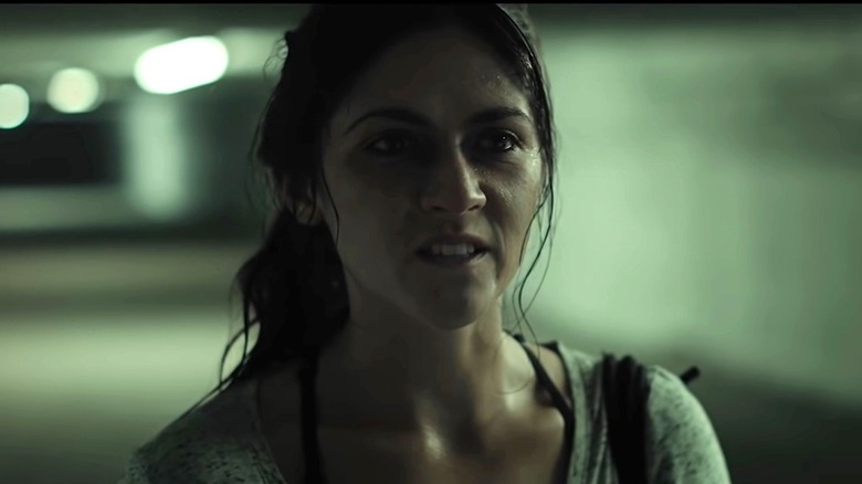 Alex Dall looking angry slightly to right