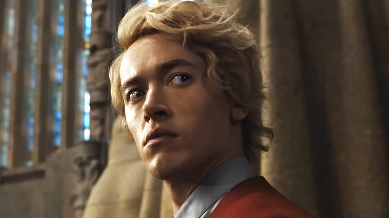 Young Coriolanus Snow glancing sideways