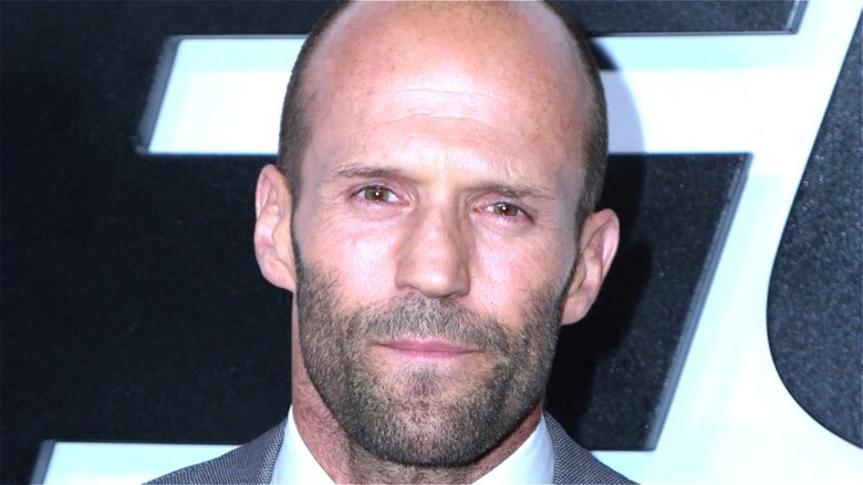 Jason Statham smiles