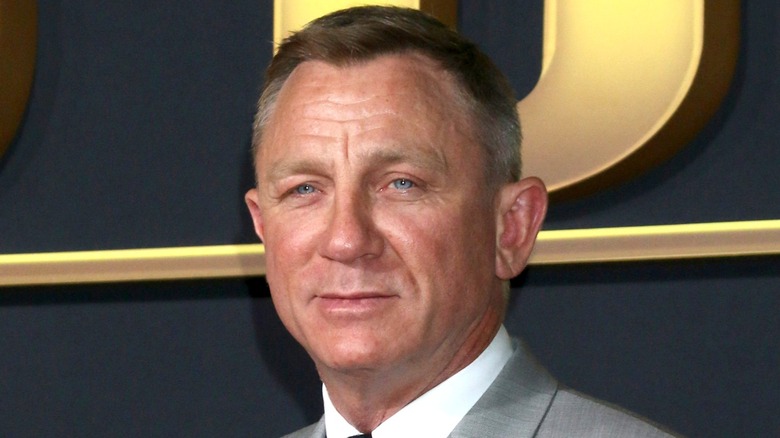 Daniel Craig smiling at event