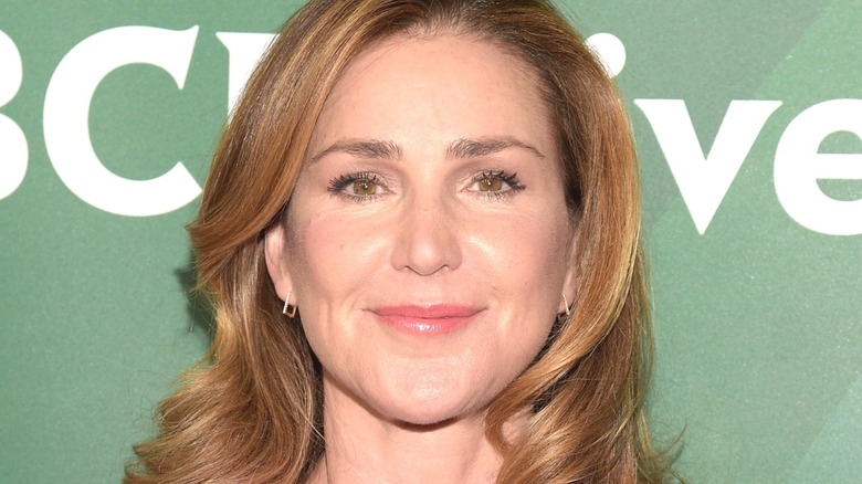 Peri Gilpin has her picture taken