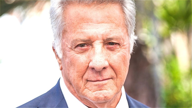 Actor Dustin Hoffman posing for photographers