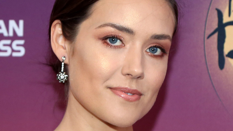 Megan Boone smiling at an event