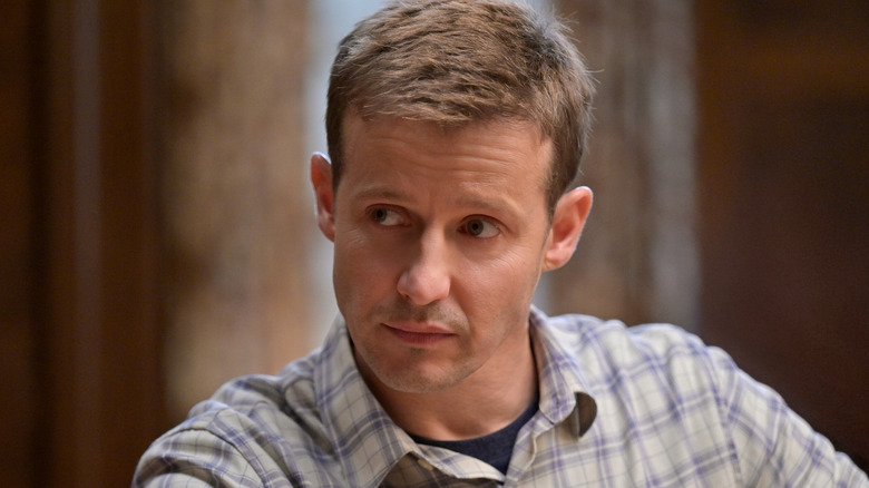 Will Estes wearing cop uniform