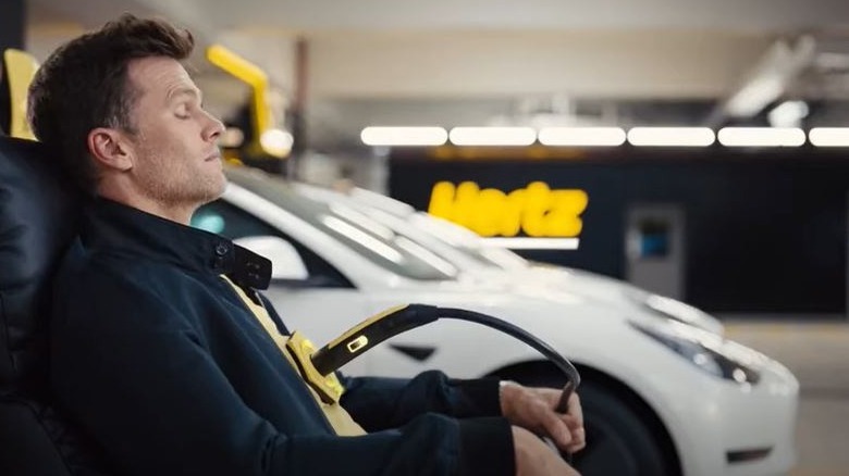 Tom Brady charging his Tesla