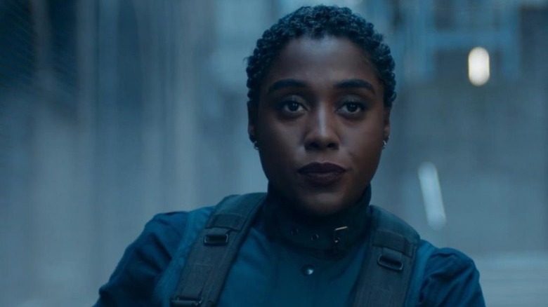 Nomi wearing tactical gear and looking confident in No Time to Die