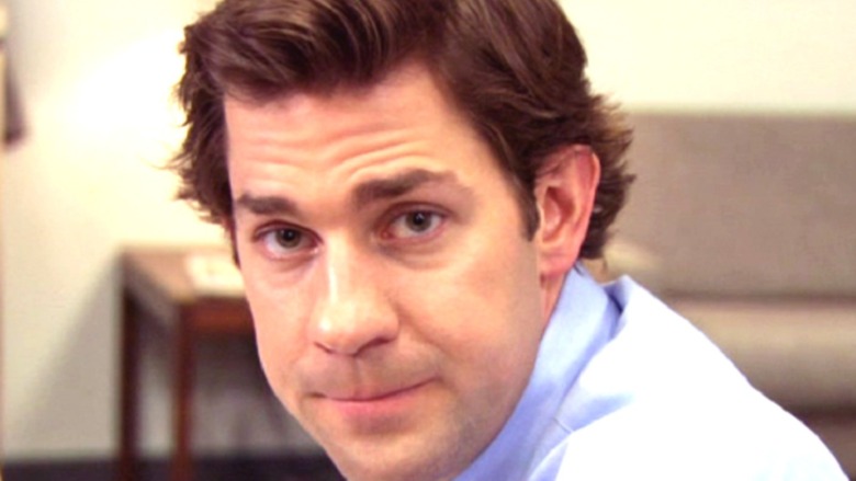 Jim Halpert looks on