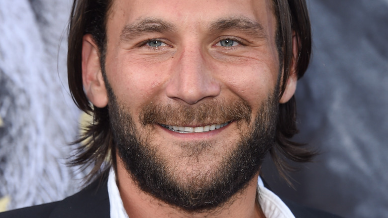 Zach McGowan smiling 