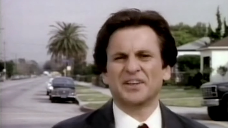 Joe Pesci walking coolly
